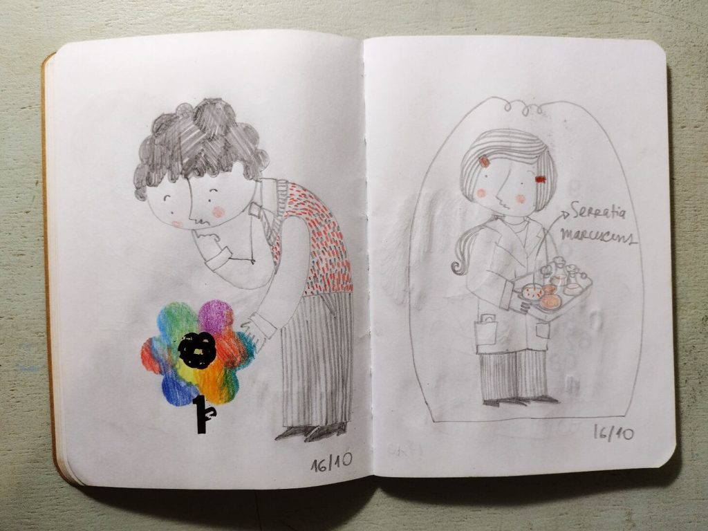 Caderno aberto com duas páginas. Uma página com rapaz olhando uma flor colorida cuja haste foi feita com um numero 1 de letraset e uma página com uma moça de jaleco segurando uma banedja com placas de Petri e frascos de cultura. De uma das placas sai uma flecha que indica o texto Serratia marcescens